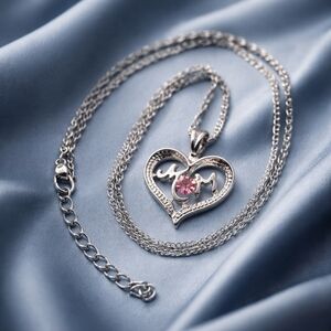 Elegant Silver Heart Necklace with Pink Gem